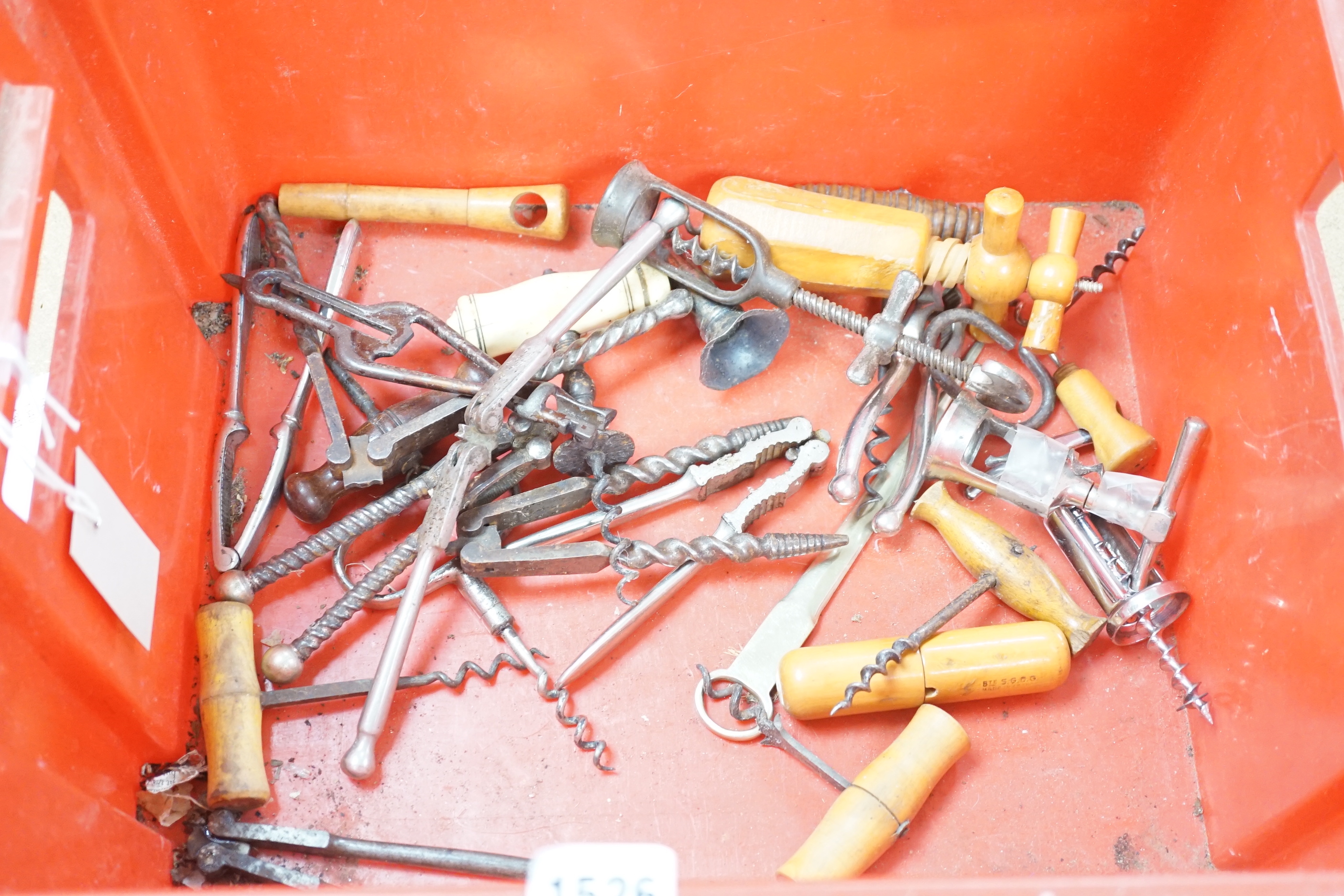 A collection of various corkscrews, bottle openers etc.